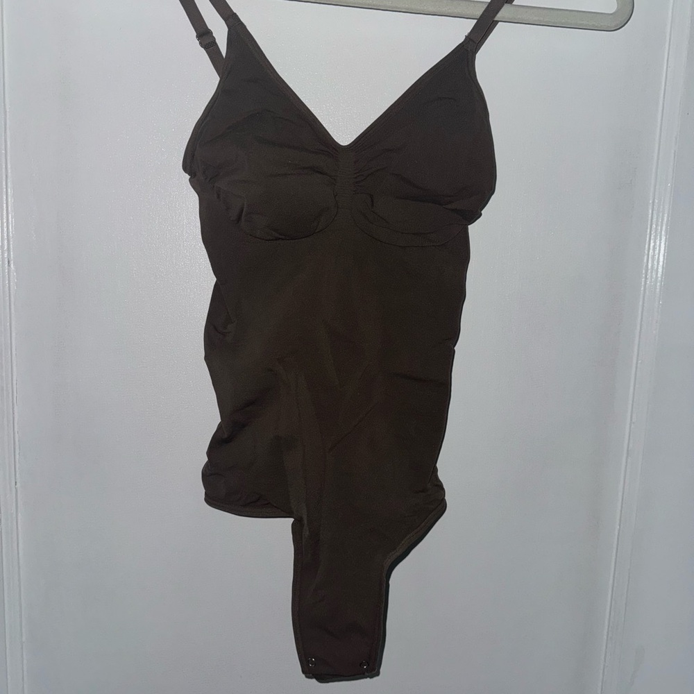 Brown bodysuit